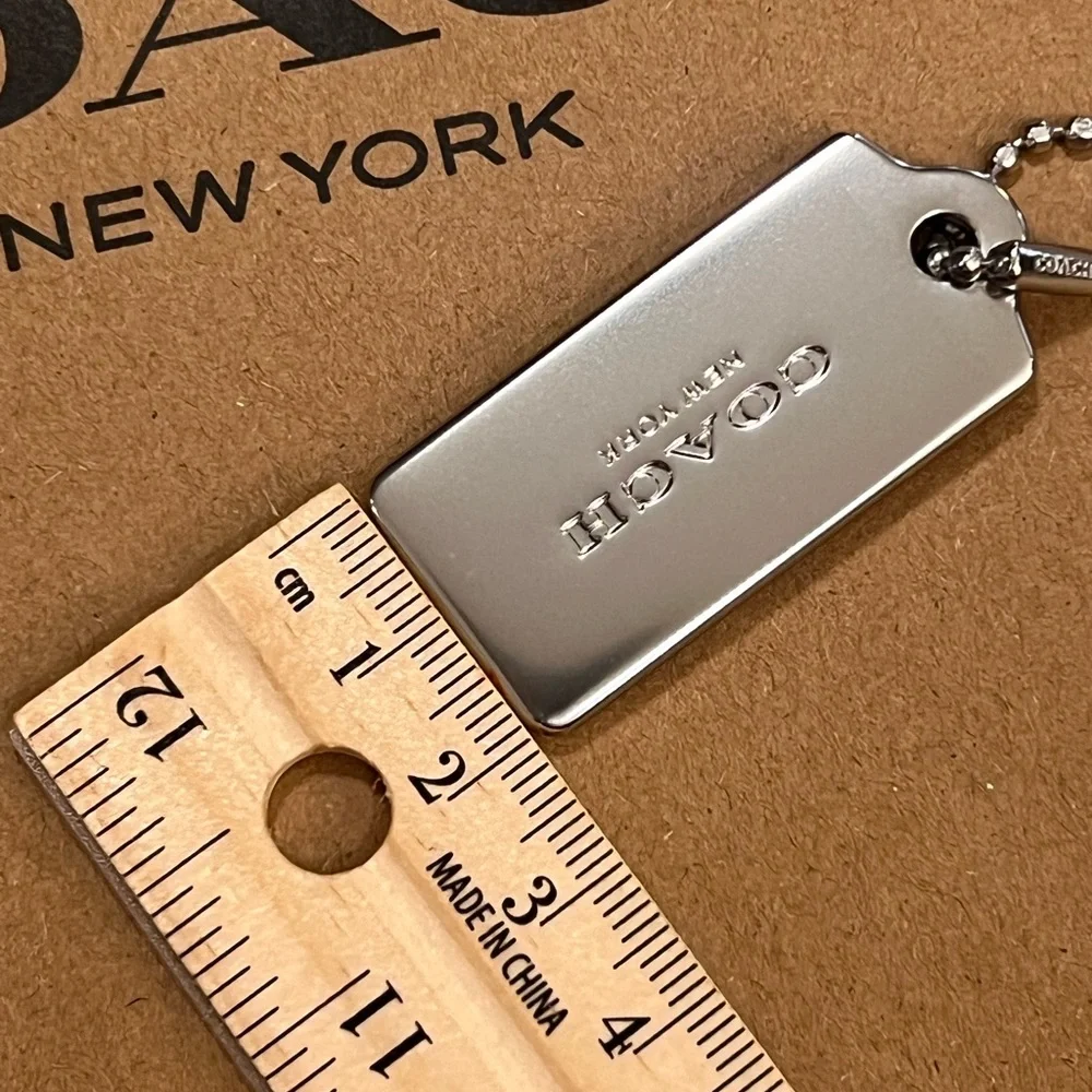 Coach Silver Engraved Dog Tag Keychain